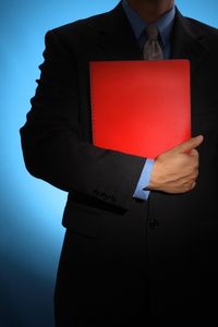 man-holding-red-folder